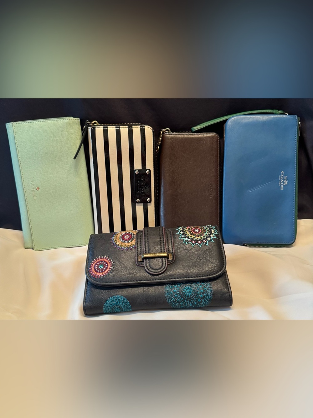 Rehab needed for lot of wallets, clutch, wristlet Coach, kate spade, & Desigual